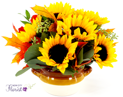 Sunflower Blooms includes sunflowers and silver dollar eucalyptus in a ceramic dish
