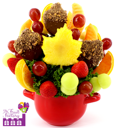 Fresh fruit bouquet with leaf and acorn shaped pineapple slices covered in chocolate