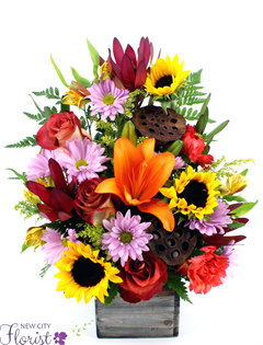 Welcome Fall Wood Cube includes sunflowers, roses, lilies and daisies in a wood container
