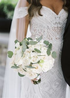 Roses & White Ranunculus Bridal Bouquet - Round Clutch Style