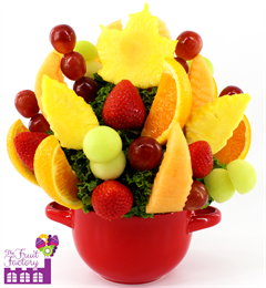 Fresh fruit bouquet includes tree & leaf shaped pineapple slices and assorted fruit