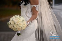 Roses & Baby's Breath Bridal Bouquet - Round Clutch Style