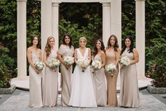 White Roses, Baby's Breath & Eucalyptus Bridesmaid Bouquet