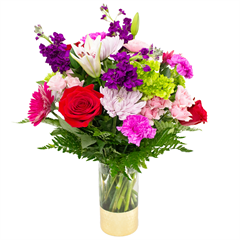 Floral Fantasy includes, gerber daisies, roses, lilies, mini hydrangeas, carnations, stock