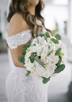 Roses & White Ranunculus Bridal Bouquet - Round Clutch Style