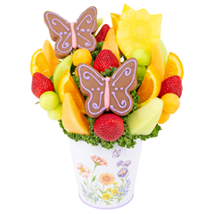 The Fruit Factory - butterfly shaped pineapple slices covered with chocolate, honey dew - Emerson NJ